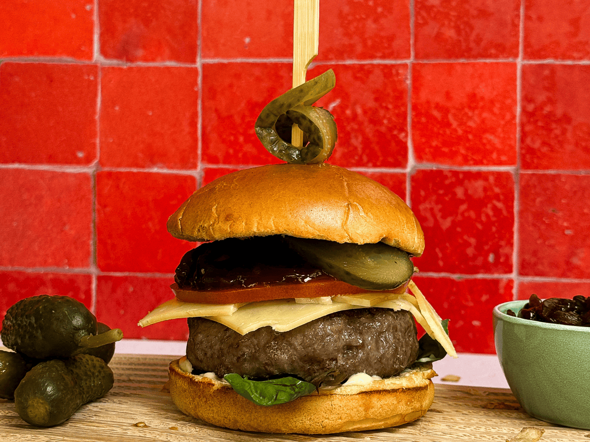 Gourmet Beef Burger with Smoked Cheddar & Red Onion Relish